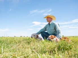 Rancher with two dogs.