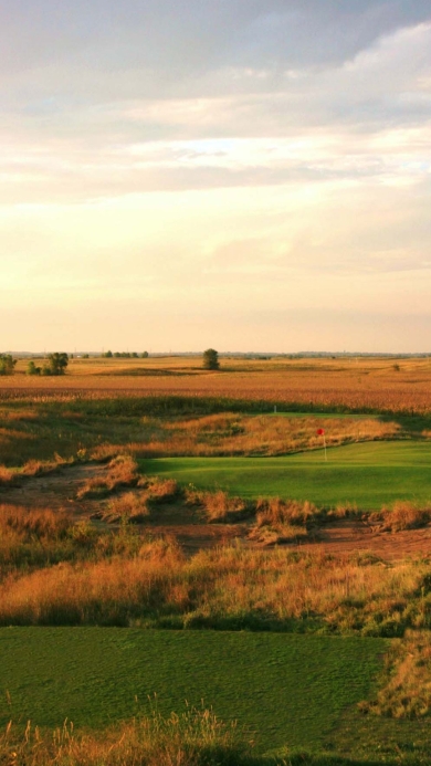 Awarii Dunes Golf Course with Scottish Links under a cloudy sky.
