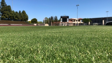 SOS performing on a sports field in Santa Clara, California.