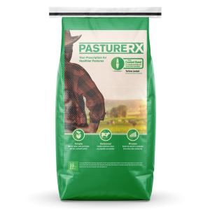 Large green bag of grass seed with a picture of a farmer and the word Pasture Rx on the front